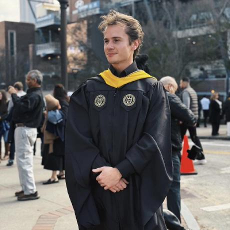 Jonathan Hampton in graduation regalia